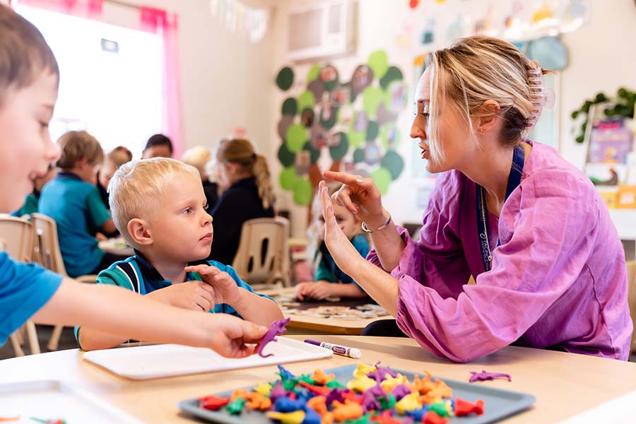 Prep teacher helping students with counting