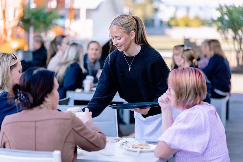 Students helping to run the Coast Café